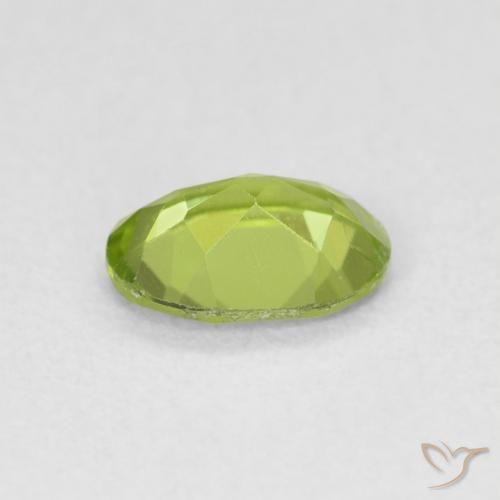 Peridoto Verde vivo natural de 0.78 ct, Ovalada, VS