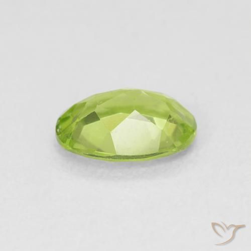 Peridoto Verde vivo natural de 0.81 ct, Ovalada, VS
