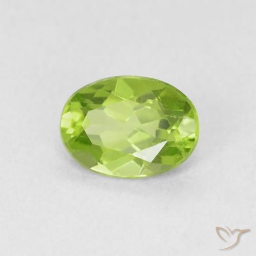 Peridoto Verde amarillento natural de 0.79 ct, Ovalada, VS