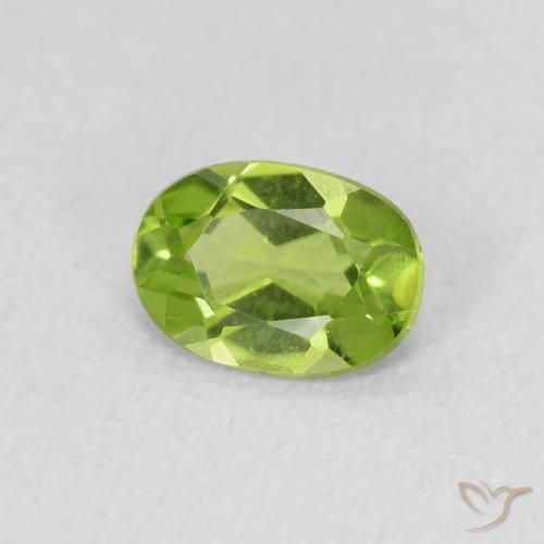 Peridoto Verde vivo natural de 0.79 ct, Ovalada, VS
