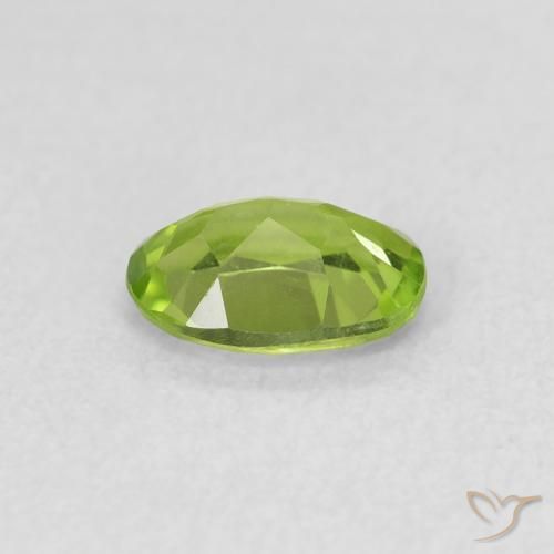 Peridoto Verde vivo natural de 0.79 ct, Ovalada, VS