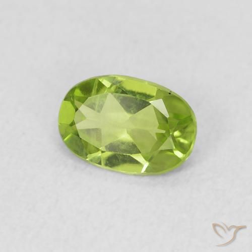 Peridoto Verde vivo natural de 0.73 ct, Ovalada, VS
