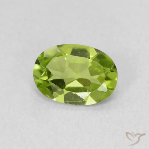 Peridoto Verde vivo natural de 0.78 ct, Ovalada, VS