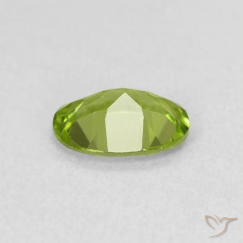 Peridoto Verde vivo natural de 0.78 ct, Ovalada, VS