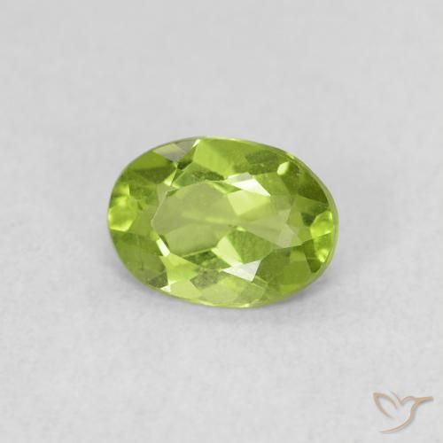 Peridoto Verde amarillento intenso natural de 0.76 ct, Ovalada, VS