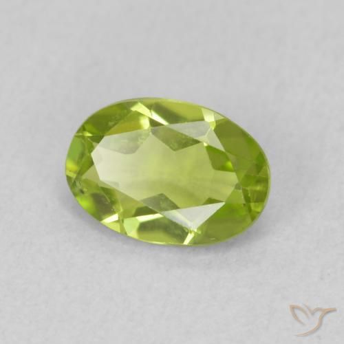 Peridoto Verde vivo natural de 0.84 ct, Ovalada, VS
