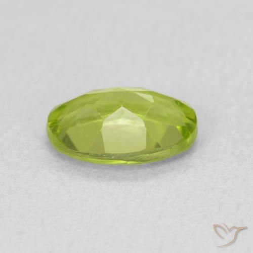 Peridoto Verde vivo natural de 0.84 ct, Ovalada, VS