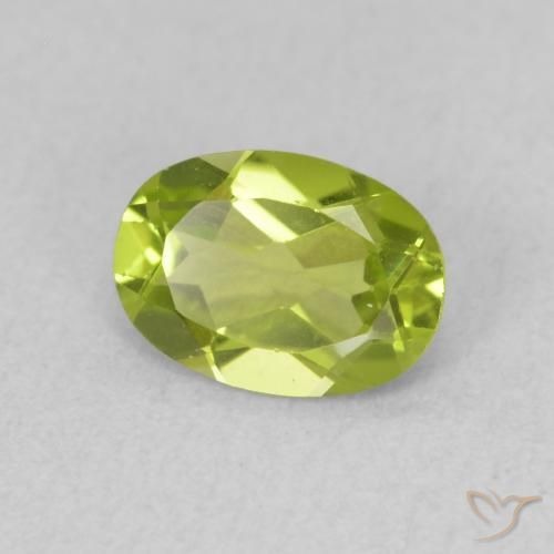 Peridoto Verde vivo natural de 0.80 ct, Ovalada, VS