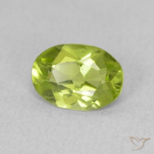 Peridoto Verde amarillento intenso natural de 0.75 ct, Ovalada, VS
