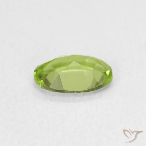 Peridoto Verde medio natural de 0.69 ct, Ovalada, VVS-VS