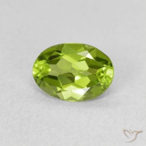 Peridoto Verde vivo natural de 0.83 ct, Ovalada, VS
