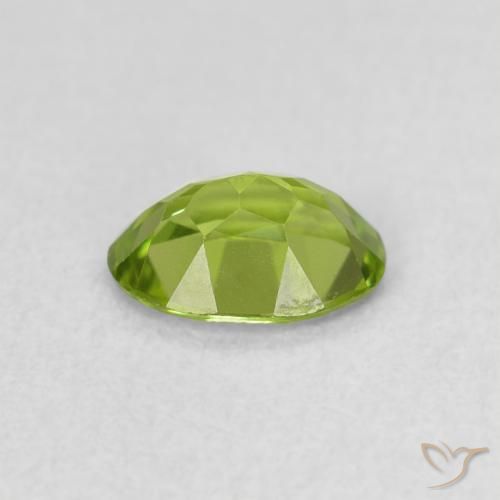 Peridoto Verde vivo natural de 0.83 ct, Ovalada, VS