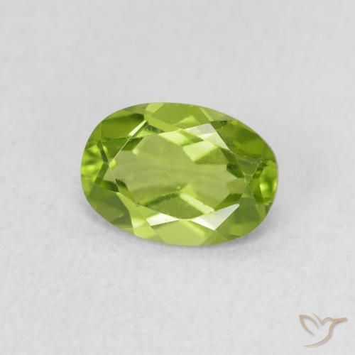 Peridoto Verde vivo natural de 0.88 ct, Ovalada, VS