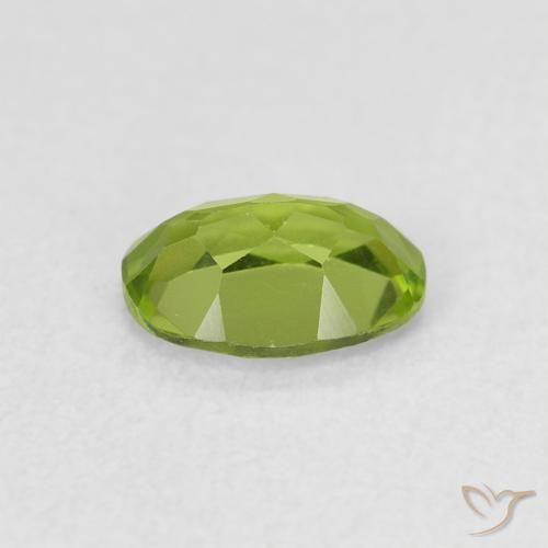 Peridoto Verde vivo natural de 0.88 ct, Ovalada, VS