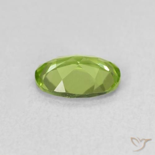 Peridoto Verde medio natural de 0.79 ct, Ovalada, VS