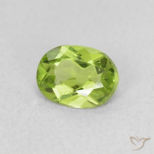 Peridoto Verde vivo natural de 0.68 ct, Ovalada, VS