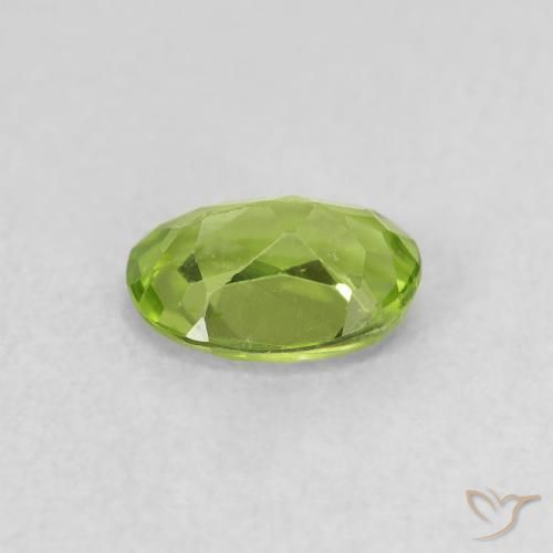 Peridoto Verde vivo natural de 0.68 ct, Ovalada, VS