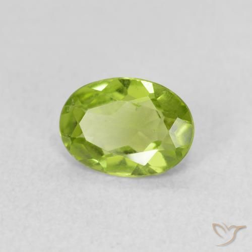 Peridoto Verde vivo natural de 0.68 ct, Ovalada, VS