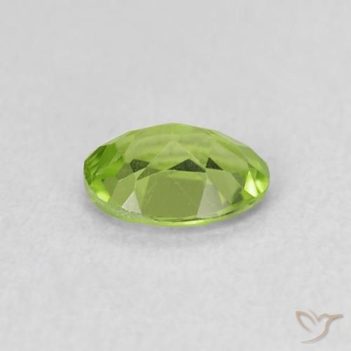 Peridoto Verde medio natural de 0.73 ct, Ovalada, VS