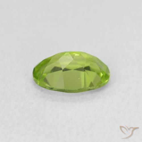 Peridoto Verde medio natural de 0.83 ct, Ovalada, VS