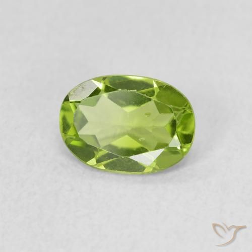 Peridoto Verde vivo natural de 0.77 ct, Ovalada, VS