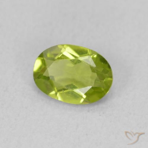 Peridoto Verde vivo natural de 0.81 ct, Ovalada, VS