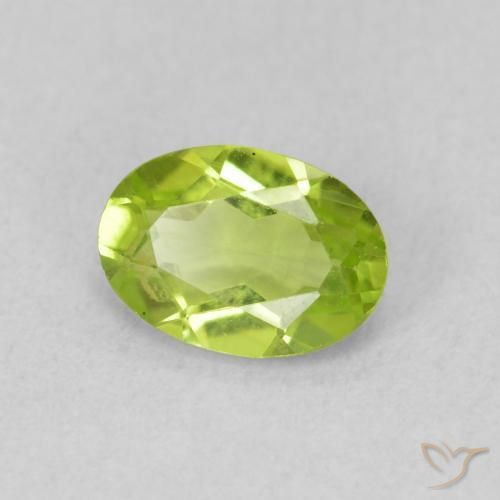 Peridoto Verde amarillento intenso natural de 0.84 ct, Ovalada, VS