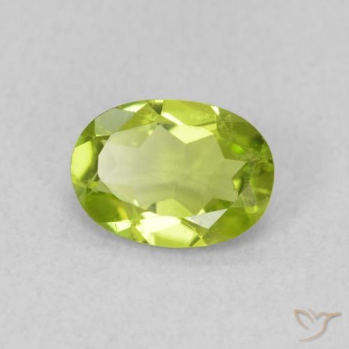 Peridoto Verde medio natural de 0.80 ct, Ovalada, VS