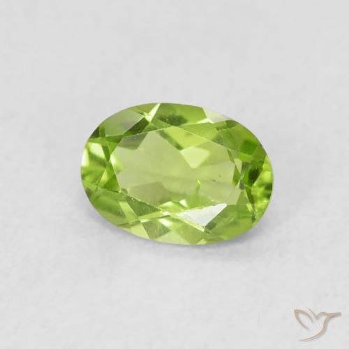 Peridoto Verde vivo natural de 0.83 ct, Ovalada, VS