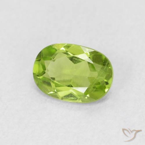 Peridoto Verde vivo natural de 0.88 ct, Ovalada, VS
