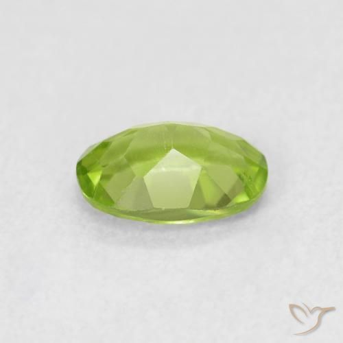 Peridoto Verde vivo natural de 0.88 ct, Ovalada, VS
