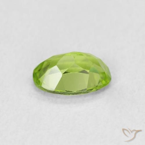 Peridoto Verde vivo natural de 0.81 ct, Ovalada, VS