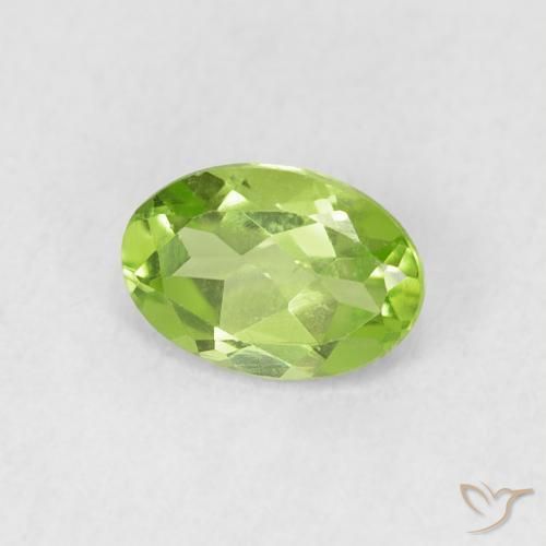 Peridoto Verde vivo natural de 0.84 ct, Ovalada, VS