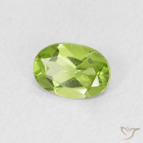 Peridoto Verde medio natural de 0.71 ct, Ovalada, VS