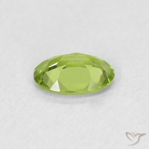 Peridoto Verde medio natural de 0.71 ct, Ovalada, VS