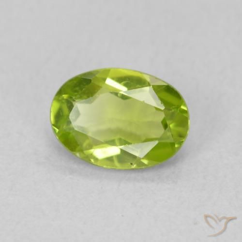 Peridoto Verde vivo natural de 0.83 ct, Ovalada, VS