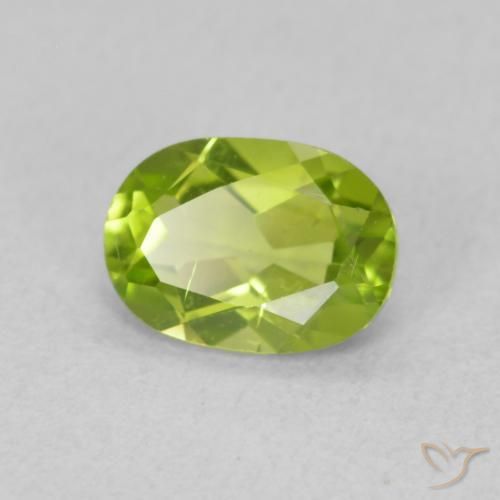 Peridoto Verde claro natural de 0.89 ct, Ovalada, VS