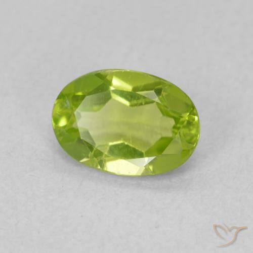 Peridoto Verde medio natural de 0.83 ct, Ovalada, VS