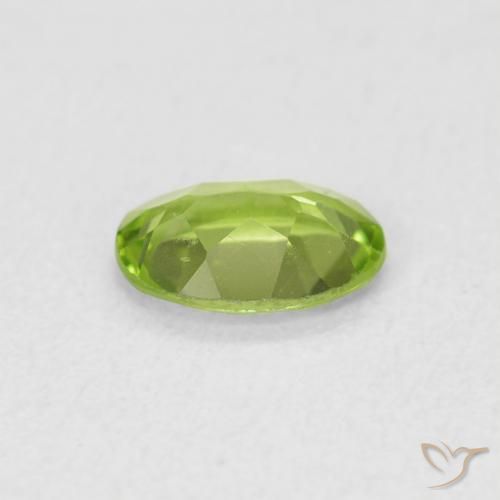Peridoto Verde vivo claro natural de 0.73 ct, Ovalada, VS