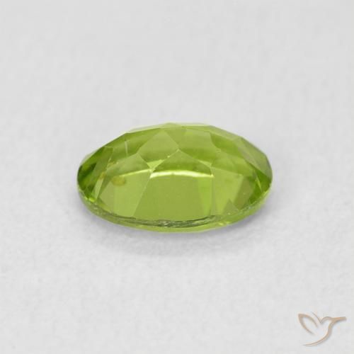 Peridoto Verde vivo natural de 0.92 ct, Ovalada, VS