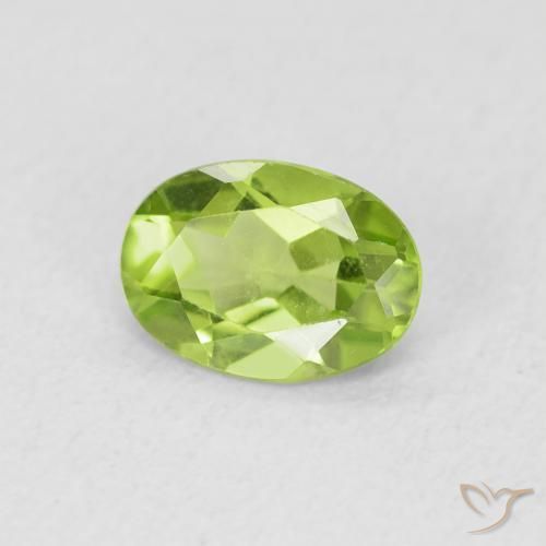 Peridoto Verde vivo natural de 0.79 ct, Ovalada, VS
