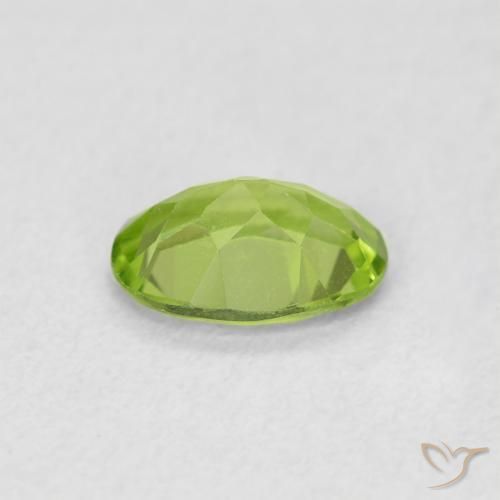 Peridoto Verde vivo natural de 0.79 ct, Ovalada, VS