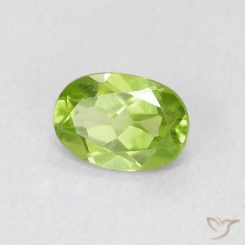 Peridoto Verde vivo natural de 0.83 ct, Ovalada, VS