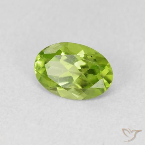 Peridoto Verde amarillento natural de 0.73 ct, Ovalada, VS