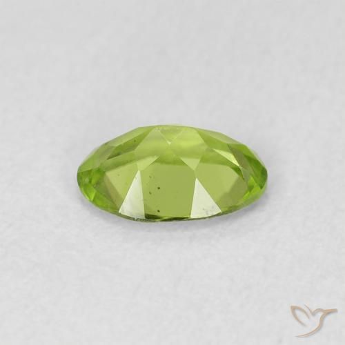 Peridoto Verde amarillento natural de 0.73 ct, Ovalada, VS