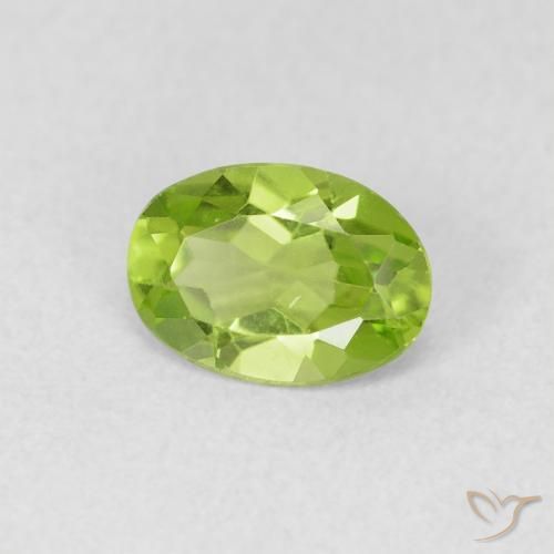 Peridoto Verde vivo natural de 0.77 ct, Ovalada, VS