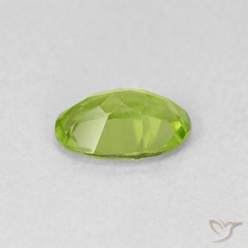 Peridoto Verde vivo natural de 0.77 ct, Ovalada, VS