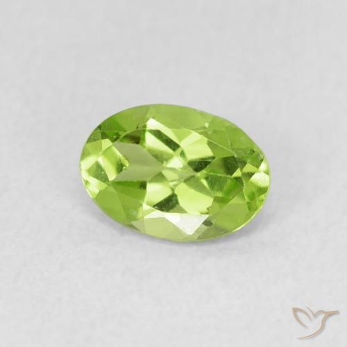 Peridoto Verde vivo natural de 0.78 ct, Ovalada, VS