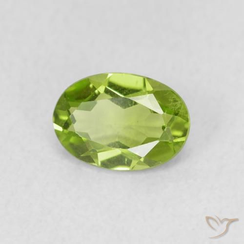 Peridoto Verde vivo natural de 0.84 ct, Ovalada, VS