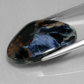 Pietersita negro natural de 16,51 ct, forma elegante, opaco